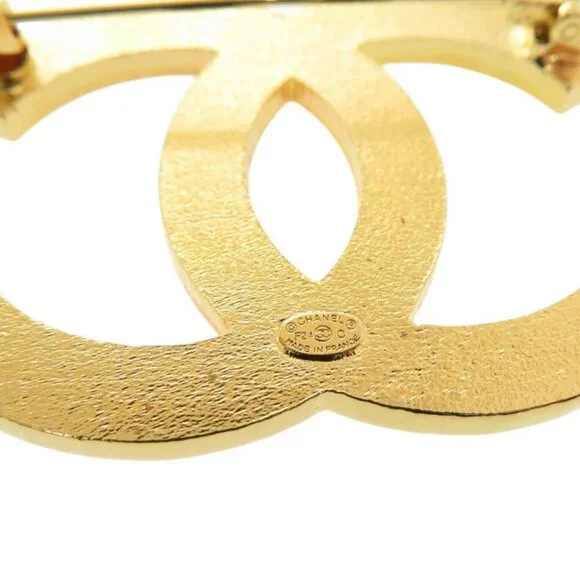 CHANEL Pink Logo Brooch
